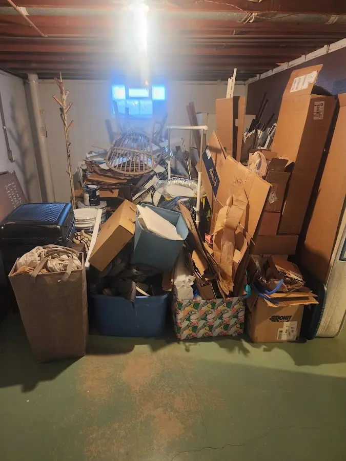 Roll-off dumpster container at job site for 2 Yard Dumpster Rental in Potomac Mills